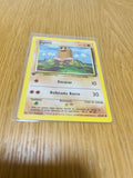 Diglett Base Set 1.ª edición española, anverso de la carta fotografiada