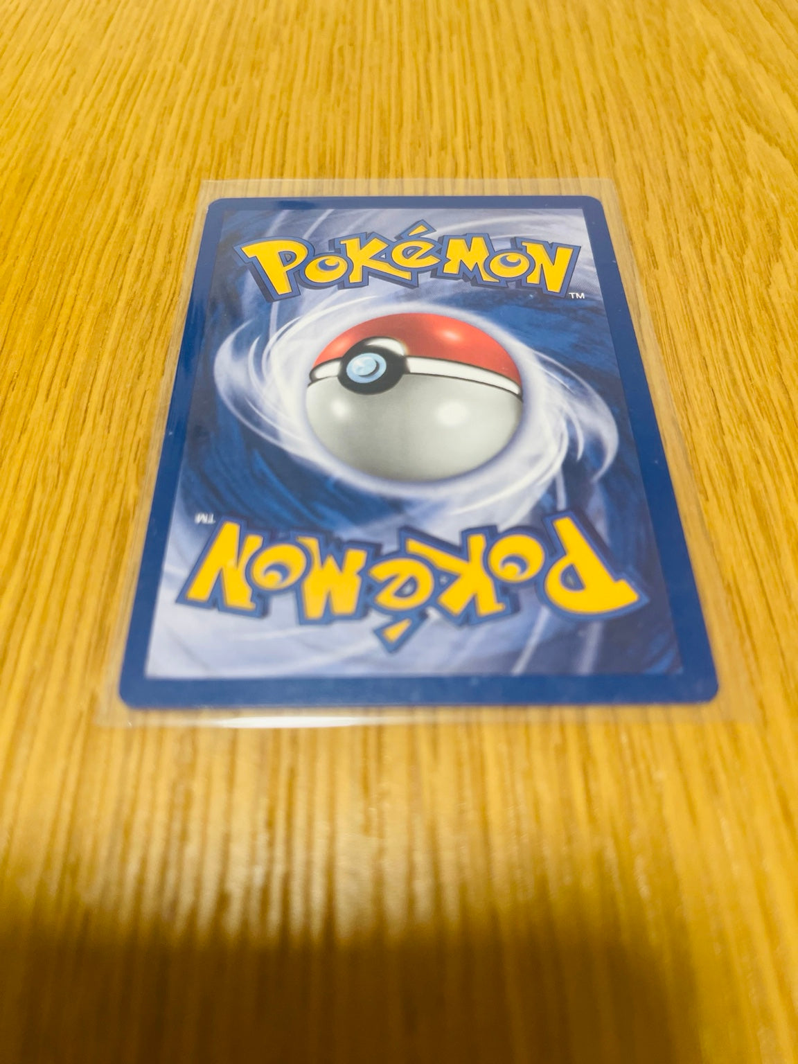 Diglett Base Set 1.ª edición española, reverso de la carta fotografiada