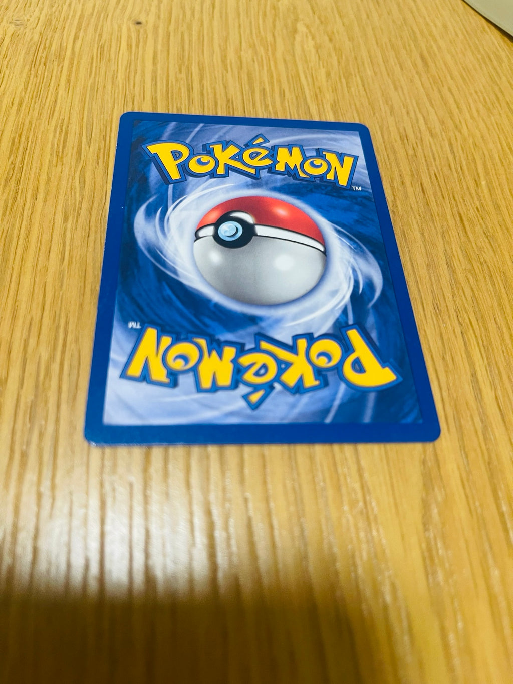 Energía Fuego Base Set 1.ª edición española, reverso de la carta fotografiada