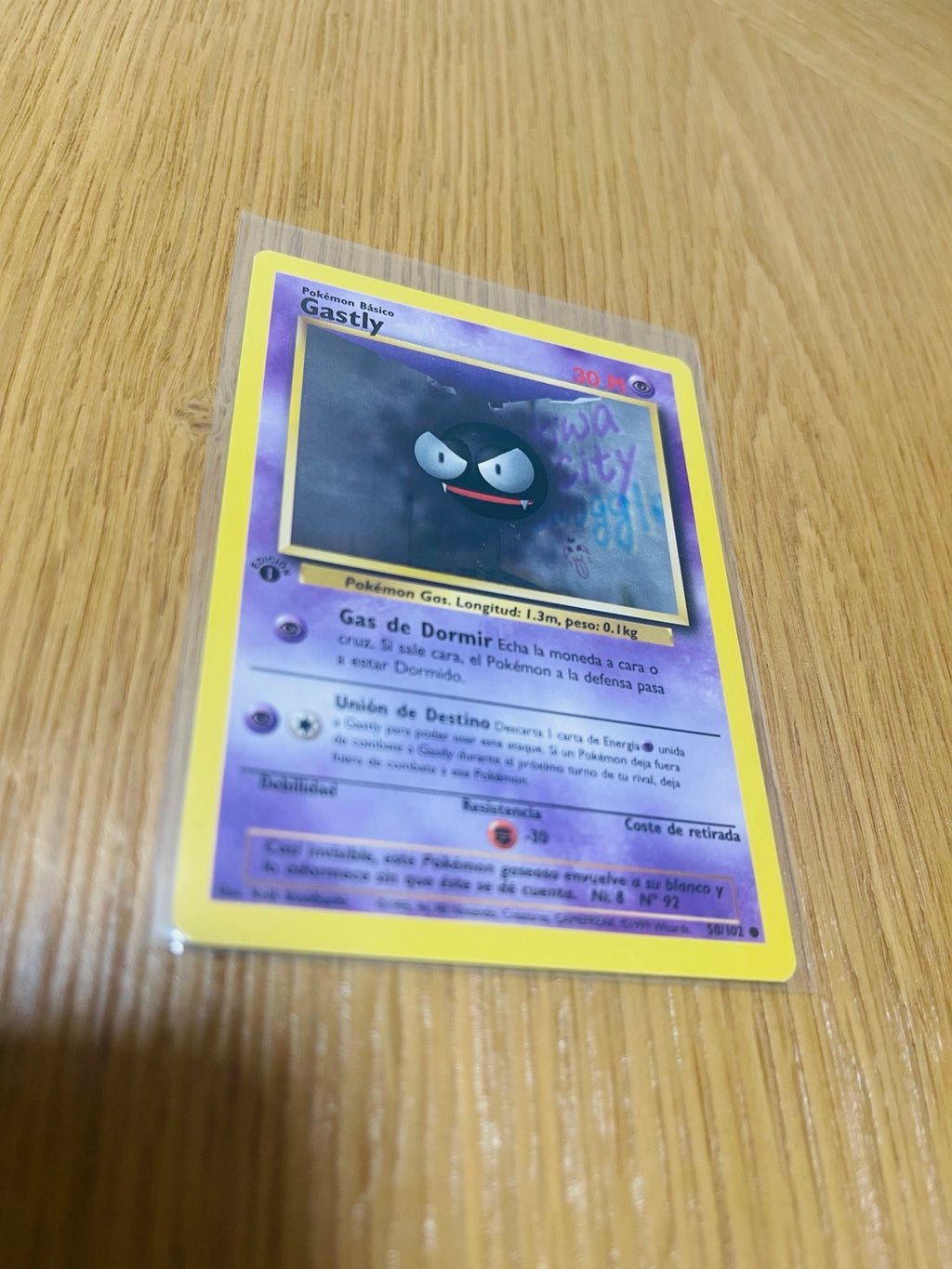 Gastly Base Set 1.ª edición española, anverso de la carta fotografiada