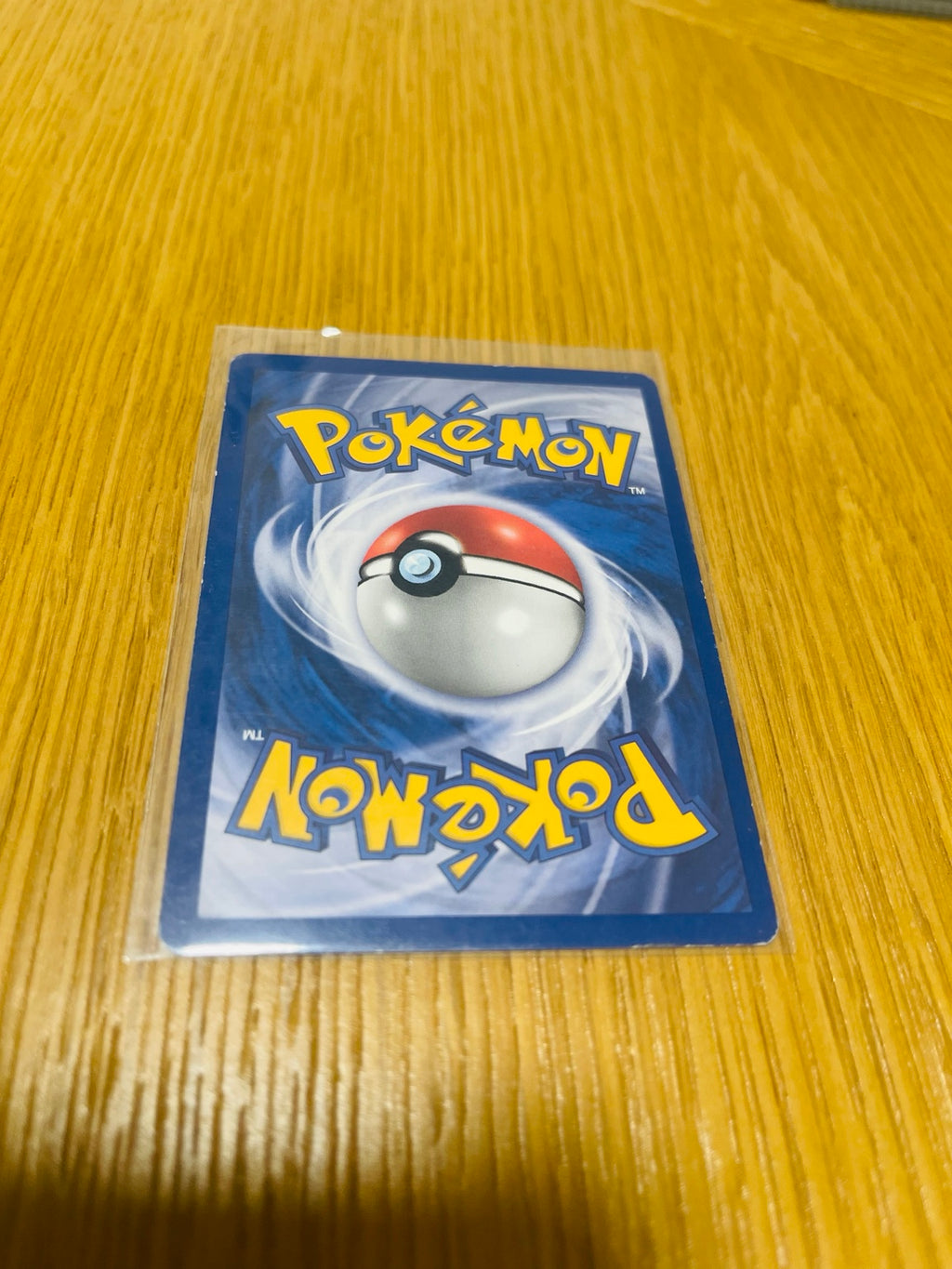 Growlithe Base Set 1.ª edición española, reverso de la carta fotografiada