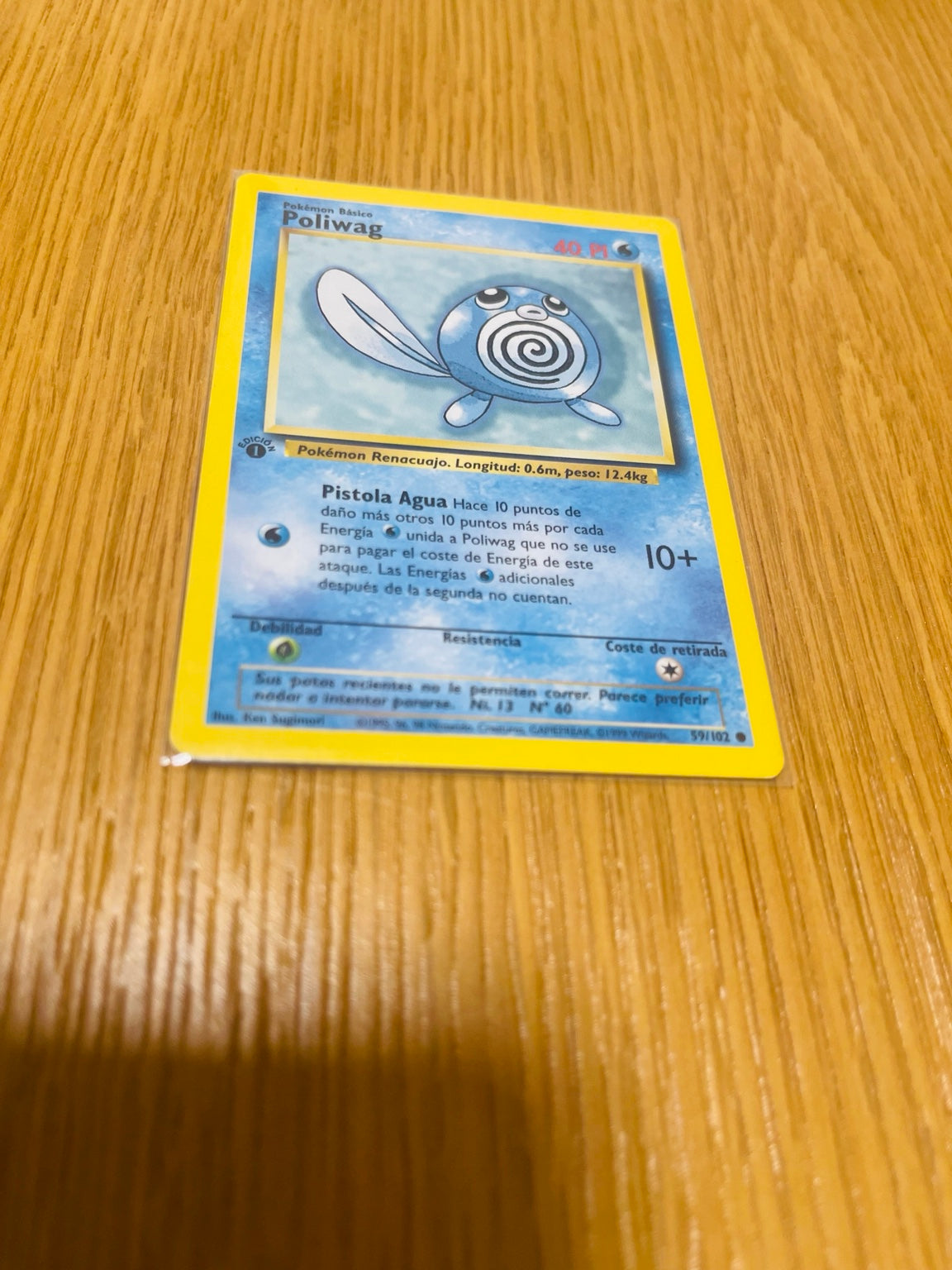 Poliwag Base Set 1.ª edición española, anverso de la carta fotografiada