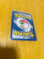 Sandshrew Base Set 1.ª edición española, reverso de la carta fotografiada