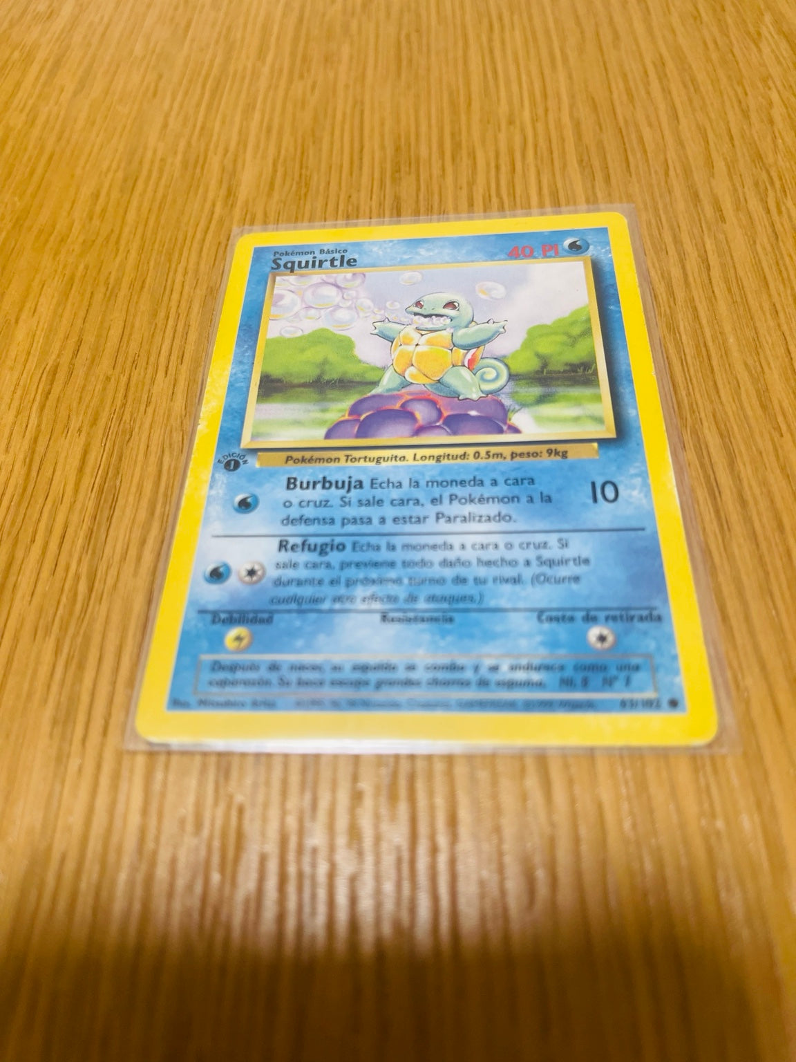 Squirtle Base Set 1.ª edición española, anverso de la carta fotografiada