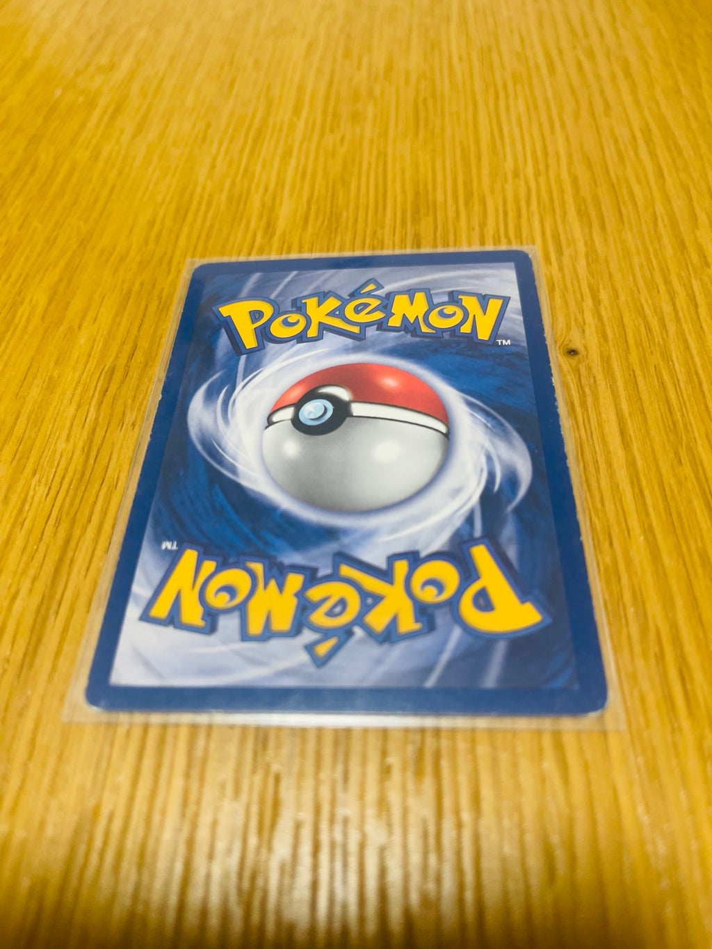 Squirtle Base Set 1.ª edición española, reverso de la carta fotografiada