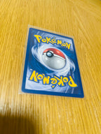Starmie Base Set 1.ª edición española, reverso de la carta fotografiada
