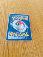 Super Poción Base Set 1.ª edición española, reverso de la carta fotografiada