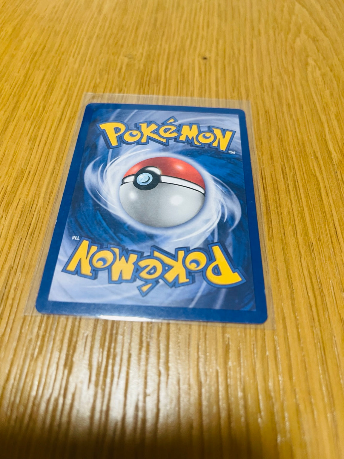 Centro de Pokémon Base Set 1.ª edición española, reverso del ejemplar fotografiado